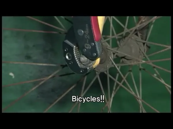 Using the wrench on a bicycle wheel